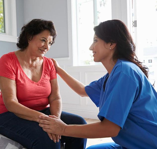 Caregiver assisting a client at home